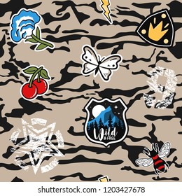 Army seamless pattern. Repeating camouflage print with cool patches. Hand drawn camo fashion background with retro and military badges. Vector illustration