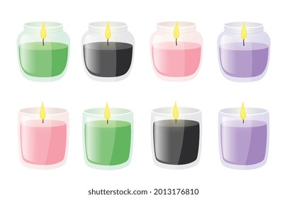 Aroma candles with flames in glass jar. Burning wax paraffin candles for aromatherapy, festive decoration element.