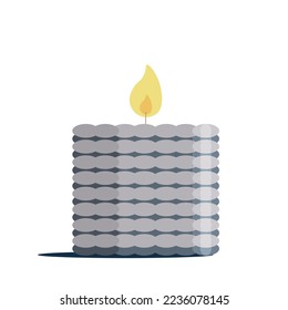 Aroma wax candle in the form of a light and dark gray striped cylinder. A design element for relaxation and rest.