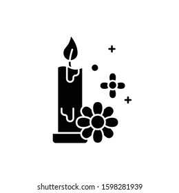 Aromatherapy glyph icon. Floral scented candle. Perfumed air freshener. Spa product. Relaxation and selfcare. Bath decoration. Silhouette symbol. Negative space. Vector isolated illustration