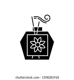 Aromatherapy glyph icon. Scented sticks in glass jar. Essential oils for relaxation. Selfcare and wellness. Therapeutic procedure. Silhouette symbol. Negative space. Vector isolated illustration