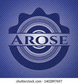 Arose badge with jean texture. Vector Illustration. Detailed.