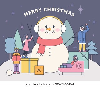 Around a large snowman, people are holding gift boxes and greeting Christmas. flat design style vector illustration.