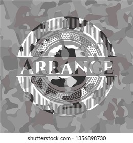 Arrange  on grey camouflage pattern