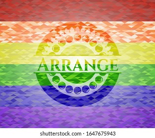 Arrange  on mosaic background with the colors of the LGBT flag