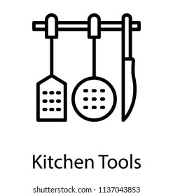 An arranged set of kitchen utensils in a row depicting cutlery 