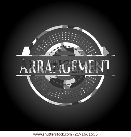 Arrangement on grey camouflage texture 