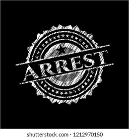 Arrest written on a chalkboard