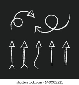 Arrow chalkboard doodles on dark background. Set of hand drawn arrows. Grungy style.