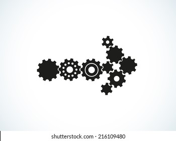 arrow created from few cogwheels of different shape and size