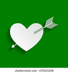 Arrow heart sign. Vector. Paper whitish icon with soft shadow on green background.