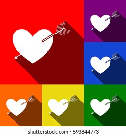 Arrow heart sign. Vector. Set of icons with flat shadows at red, orange, yellow, green, blue and violet background.
