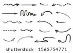 Arrow on isolated white background. Hand drawn wavy arrows. Set of different pointers. Black and white illustration