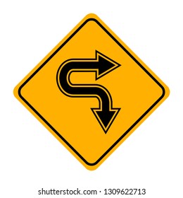 arrow road sign in yellow signage