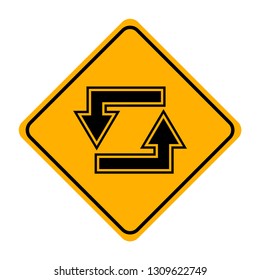 arrow road sign in yellow signage