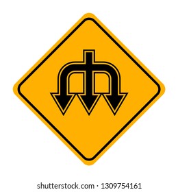 arrow road sign in yellow signage