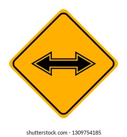 arrow road sign in yellow signage