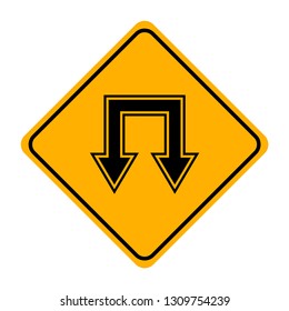 arrow road sign in yellow signage