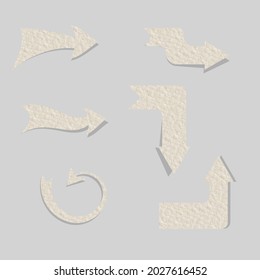 arrow tag recycled paper on gray background. paper arrows, stick