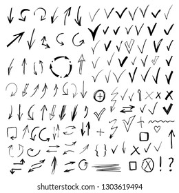 Arrows, check marks, signs. Hand drawn, doodle, sketch design elements set isolated on white background