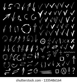 Arrows, check marks, signs. Hand drawn, doodle, sketch design elements set isolated on black background