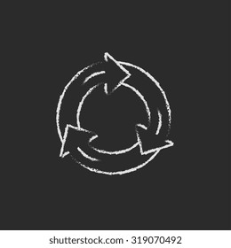 Arrows circle hand drawn in chalk on a blackboard vector white icon isolated on a black background.