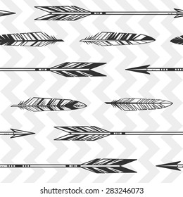 Arrows and feathers. Hand drawn vector seamless pattern