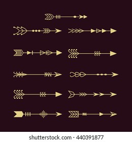 Arrows. Golden vector arrows in the traditional style. A set of arrows isolated for your design. Vintage golden arrows. Aztec, tribal style. Boho.