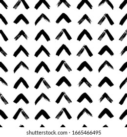 Arrows seamless pattern hand drawn with a brush. Vector Abstract Monochrome Grunge texture. Scandinavian background in a simple style for printing on textiles, paper, Wallpaper, print on t-shirts