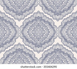 Art deco abstract vector seamless geometrical pattern from dark indigo blue  rhombus, Eskimo ornaments, lacy wavy stripes. Textile fantasy monochrome print. Wrapping paper. Bohemian Batik painting
