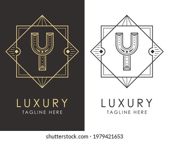 Art deco letter Y logo in two color variations. Elegant style logotype design for luxury company branding.