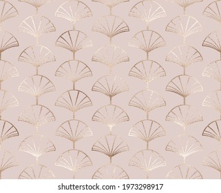Art deco seamless pattern with gold decorative fan leaves.