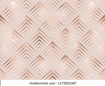 Art deco seamless pattern with rose gold rhombuses tiles.