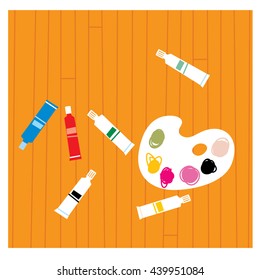 Art palette and color tubes vector illustration. Art items on the floor.