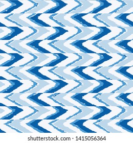 art striped, dip dye  zig zag Seamless ethnic   pattern of indigo color on white silk. Ikat seamless pattern. Vector tie dye shibori print with stripes and chevron. Ink textured japanese background. 