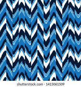 art striped, dip dye  zig zag Seamless ethnic   pattern of navy, blue  on white silk. Ikat seamless pattern. Vector tie dye shibori print with stripes and chevron. Ink textured japanese background. 
