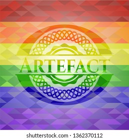 Artefact emblem on mosaic background with the colors of the LGBT flag