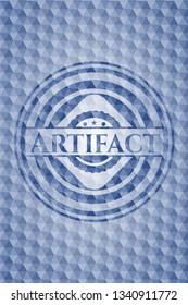 Artifact blue polygonal badge.