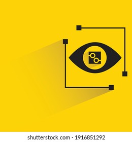 artificial eye  embed with chip shadow on yellow background