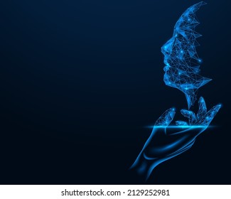 Artificial intelligence. The silhouette of the face above the palm of the hand. Polygonal design of lines and dots. Blue background.