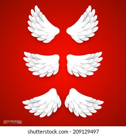Artificial white paper wings set. Vector illustration