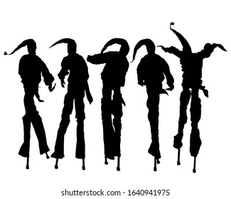 Artist in a clown costume on high stilts. Isolated silhouette on a white background