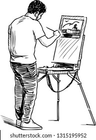 An artist painting in open air