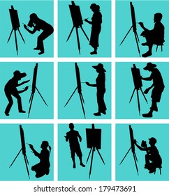 artist paints at easel 