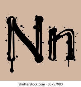 artistic alphabet with ink blots