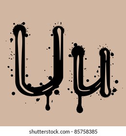 artistic alphabet with ink blots
