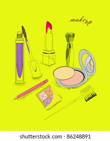 artistic background with lipstick, mascara, eye-shadows, pencil, powder and cosmetic brushes