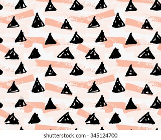 Artistic color brushed black triangles on grunge.Hand drawn with ink and marker brush seamless background.Abstract color splush and scribble design.