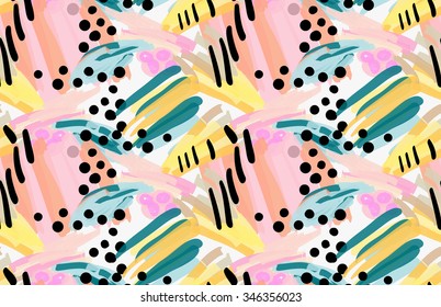 Artistic color brushed green pink yellow stocks with black dots.Hand drawn with ink seamless background. Abstract color splash and scribble seamless design.Creative hand painted textile fabric texture