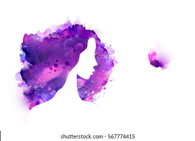 Artistic creative abstract image created by purple, violet, lilac blotch and stains. Beautiful woman admires painted butterflies.